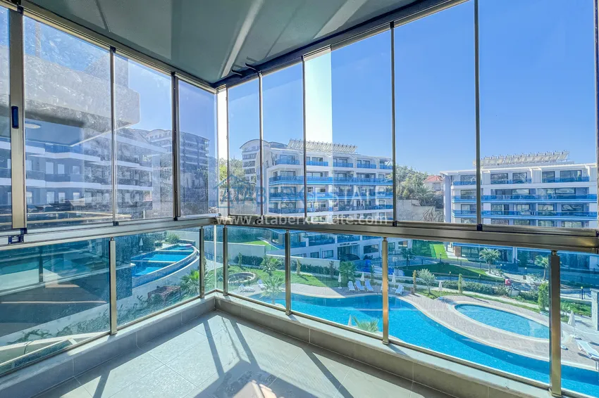 Kupuj  Apartament 1+1 z przeszklonym balkonem i widokiem na morze, dzielnica Kargicak — Alanya 9 