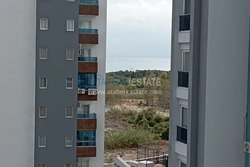 Kupuj  Przestronny apartament 1+1 z widokiem na morze i 2 przeszklonymi balkonami w Mersin, Arpacbakhshish 10 