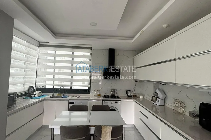 Kupuj  Apartament z dwiema sypialniami i przeszklonym balkonem w Mersin, dzielnica Tomyuk 5 