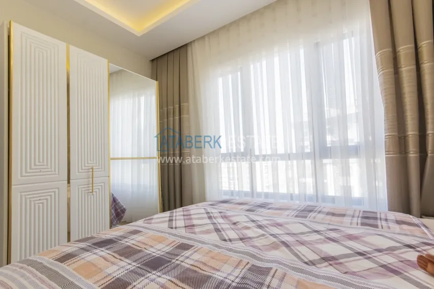 Kupuj  Nieruchomość od właściciela w Alanyi - Apartament pod klucz z widokiem na morze w Mahmutlar 11 