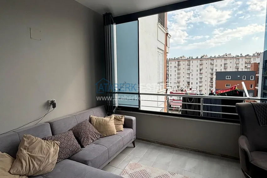 Kupuj  Apartament z dwiema sypialniami i przeszklonym balkonem w Mersin, dzielnica Tomyuk 7 