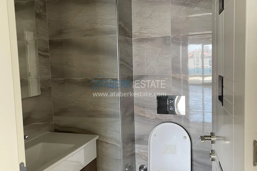 Kupuj  Ogromne mieszkanie 1+1 o powierzchni 110 m2 w centrum dzielnicy Mahmutlar 12 