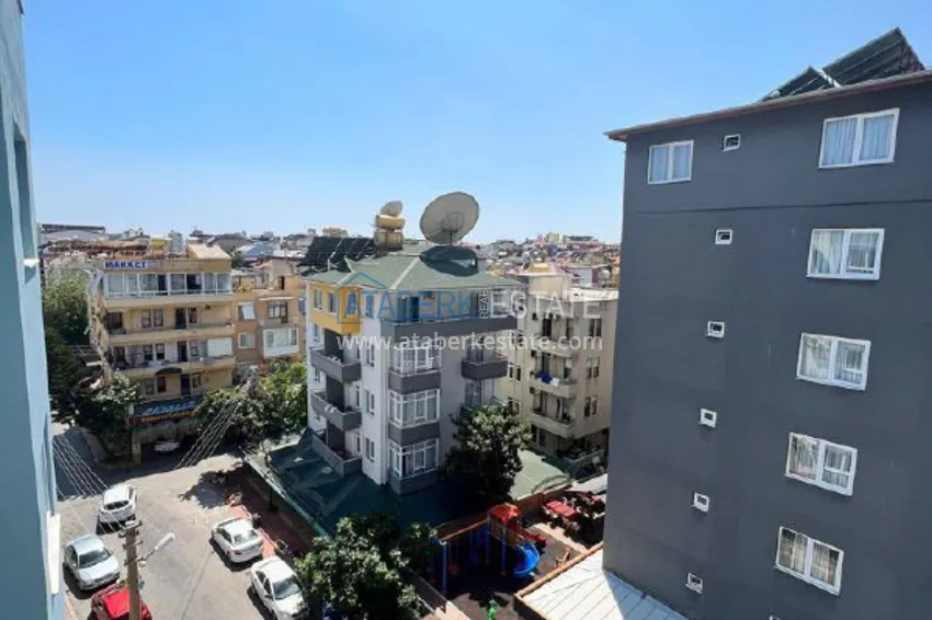 Kupuj  Umeblowany apartament z widokiem na góry w centrum Alanyi, w pobliżu plaży Kleopatra. Nieruchomość na zezwolenie na pobyt 13 