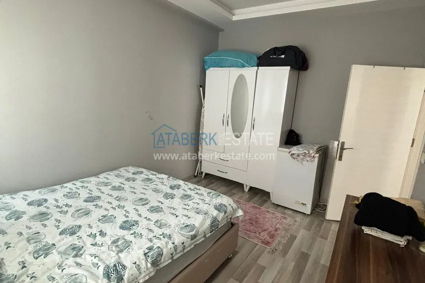 Kupuj  Apartament z dwiema sypialniami i przeszklonym balkonem w Mersin, dzielnica Tomyuk 9 