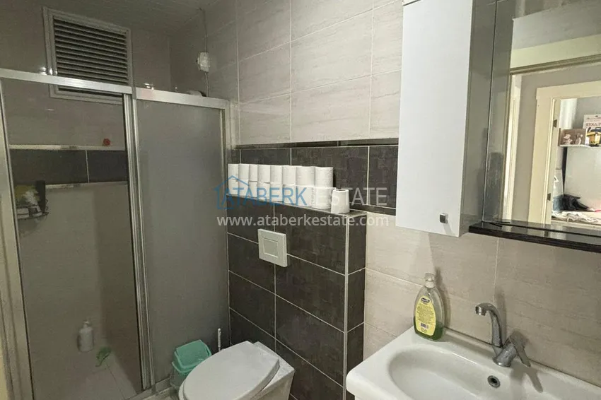Kupuj  Apartament z dwiema sypialniami i przeszklonym balkonem w Mersin, dzielnica Tomyuk 11 