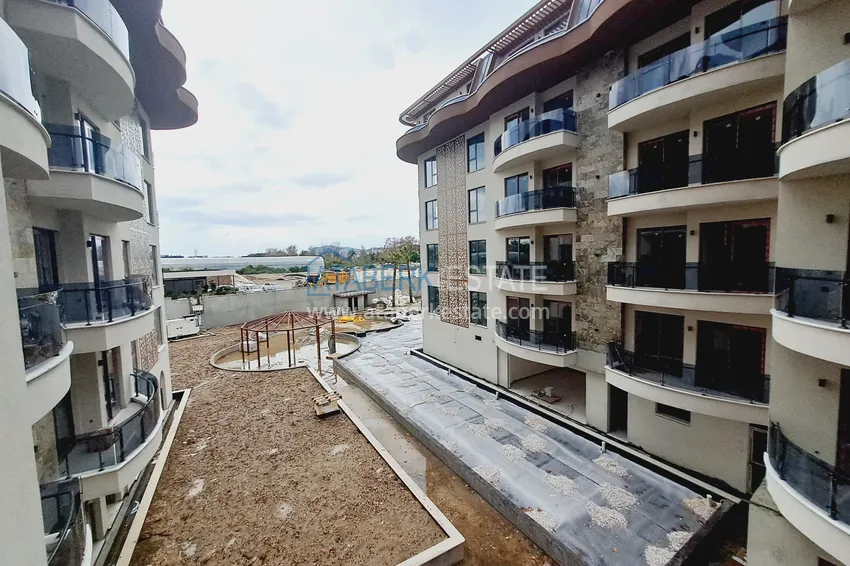 Kupuj  Mieszkanie od właściciela w kompleksie w trakcie realizacji — Alanya, dzielnica Oba  10 