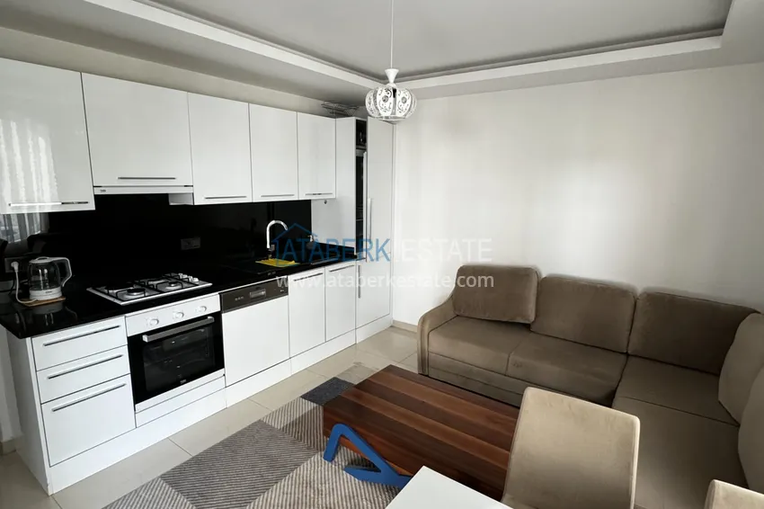Kupuj  Nieruchomość na zezwolenie na pobyt. Apartament pod klucz 1+1 w centrum Alanyi — Plaża Kleopatra 1 