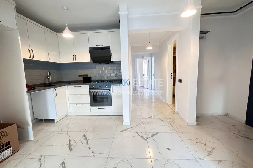 Kupuj  PILNA SPRZEDAŻ: W pełni odnowiony apartament z dwiema sypialniami w dzielnicy Menderes, Mezitli 2 