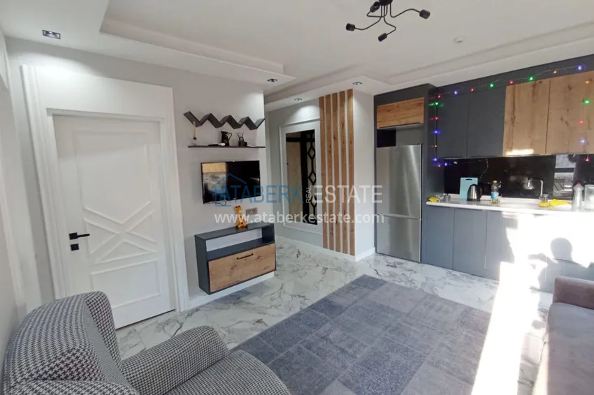 Kupuj  Apartament z jedną sypialnią pod klucz z przeszklonym balkonem od właściciela w centrum Mezitli 2 