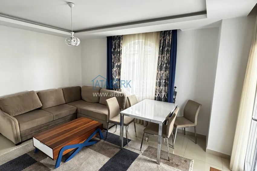Kupuj  Nieruchomość na zezwolenie na pobyt. Apartament pod klucz 1+1 w centrum Alanyi — Plaża Kleopatra 2 