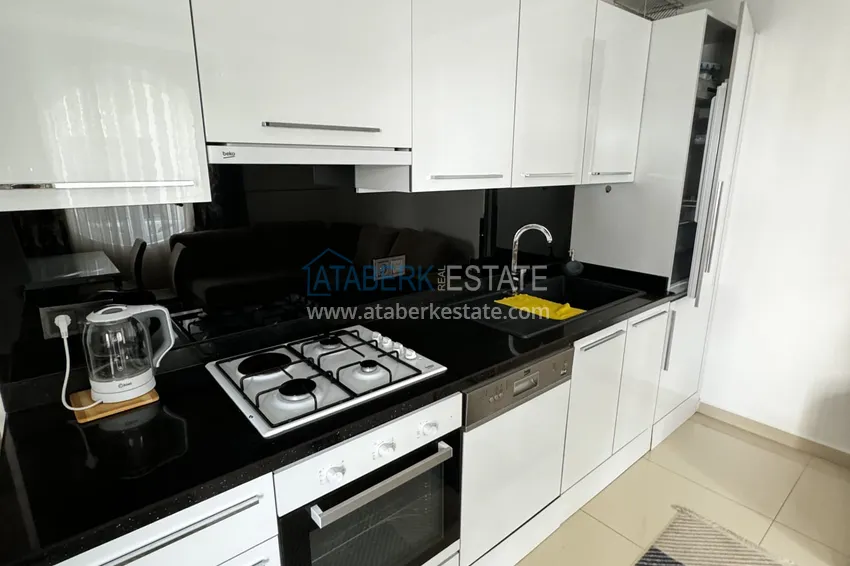 Kupuj  Nieruchomość na zezwolenie na pobyt. Apartament pod klucz 1+1 w centrum Alanyi — Plaża Kleopatra 3 