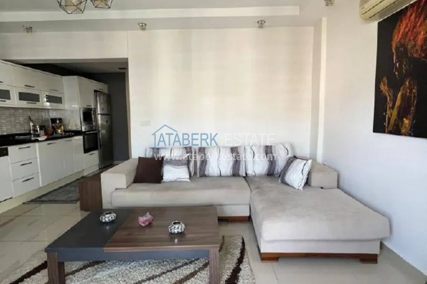 Kupuj  Umeblowany apartament z widokiem na góry w centrum Alanyi, w pobliżu plaży Kleopatra. Nieruchomość na zezwolenie na pobyt 3 