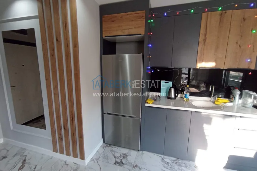 Kupuj  Apartament z jedną sypialnią pod klucz z przeszklonym balkonem od właściciela w centrum Mezitli 3 