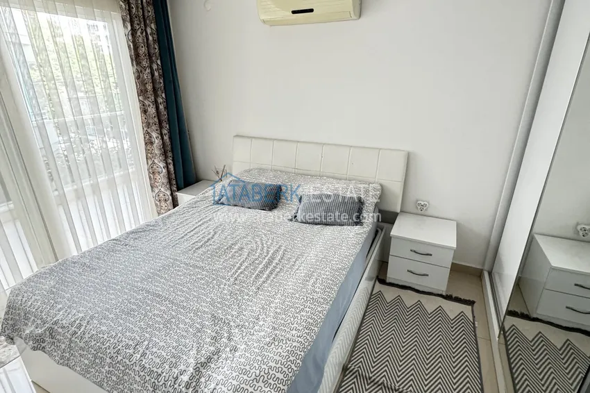 Kupuj  Nieruchomość na zezwolenie na pobyt. Apartament pod klucz 1+1 w centrum Alanyi — Plaża Kleopatra 4 