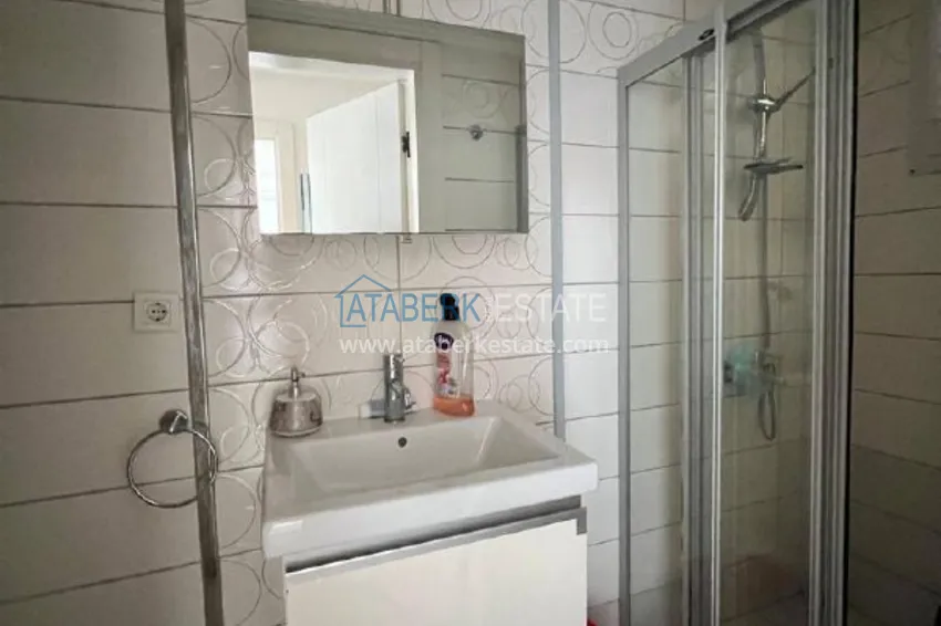 Kupuj  Umeblowany apartament z widokiem na góry w centrum Alanyi, w pobliżu plaży Kleopatra. Nieruchomość na zezwolenie na pobyt 7 