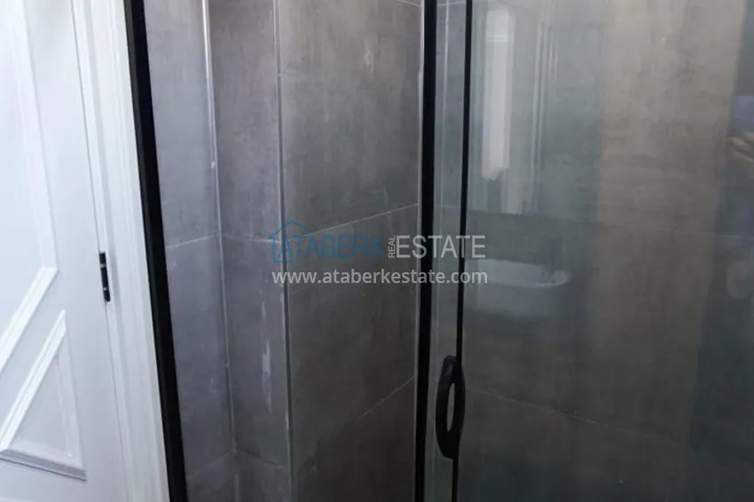 Kupuj  Apartament z jedną sypialnią pod klucz z przeszklonym balkonem od właściciela w centrum Mezitli 7 