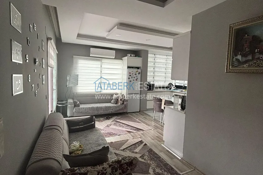 Kupuj  Apartament z dwiema sypialniami i przeszklonym balkonem w Mersin, dzielnica Tomyuk 2 