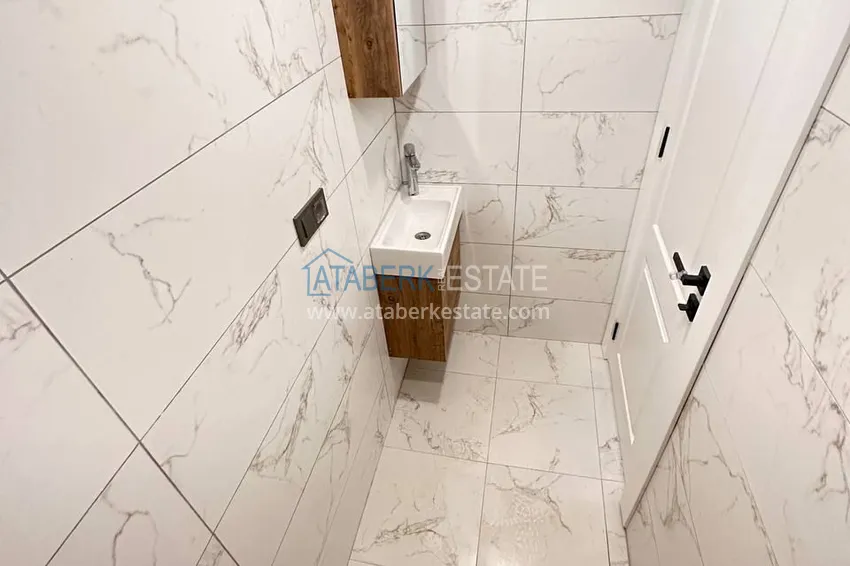 Kupuj  PILNA SPRZEDAŻ: W pełni odnowiony apartament z dwiema sypialniami w dzielnicy Menderes, Mezitli 9 
