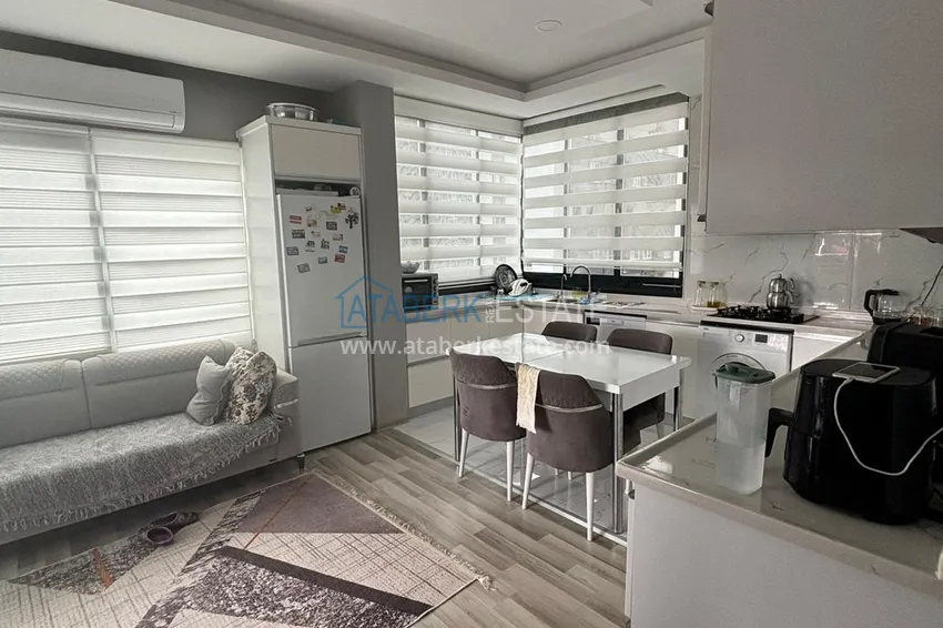 Kupuj  Apartament z dwiema sypialniami i przeszklonym balkonem w Mersin, dzielnica Tomyuk 4 