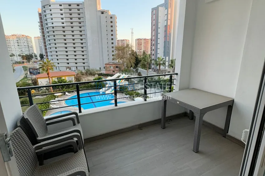 Kupuj  Jednopokojowy apartament z meblami w zadbanym kompleksie — Mersin, dzielnica Tomyuk 10 