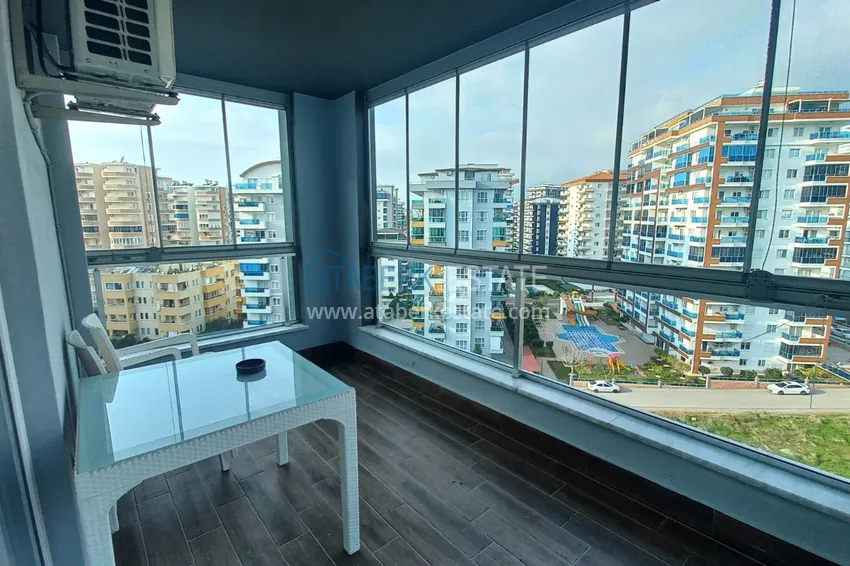 Kupuj  Apartament 1+1 w Mahmutlar, pod klucz z przeszklonym balkonem w nowoczesnym kompleksie 11 