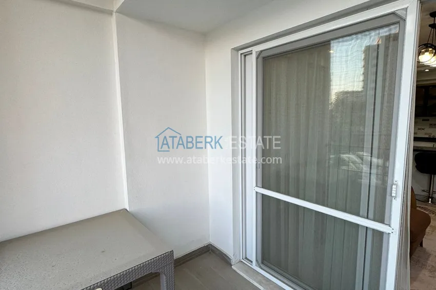 Kupuj  Jednopokojowy apartament z meblami w zadbanym kompleksie — Mersin, dzielnica Tomyuk 11 