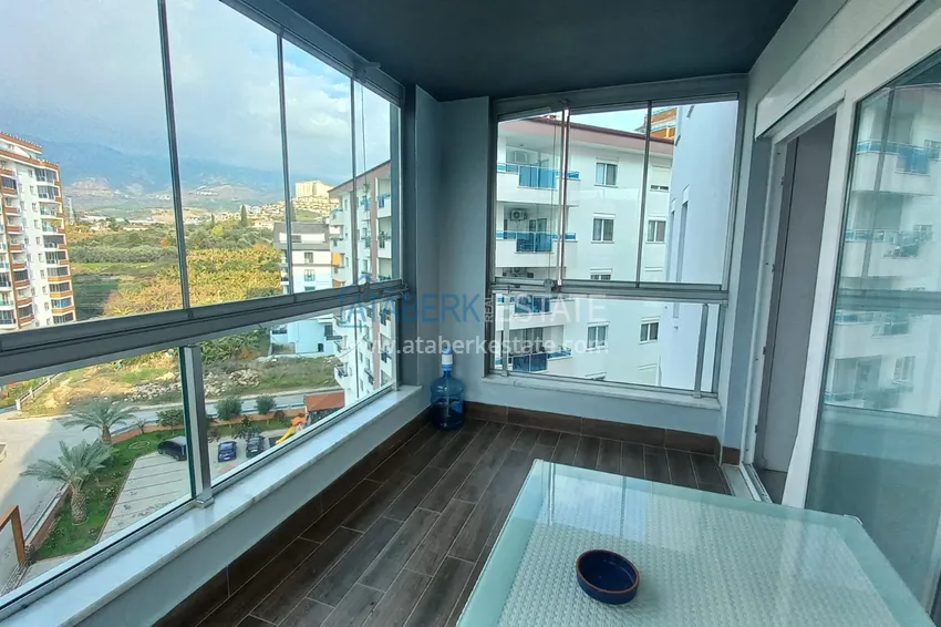 Kupuj  Apartament 1+1 w Mahmutlar, pod klucz z przeszklonym balkonem w nowoczesnym kompleksie 12 