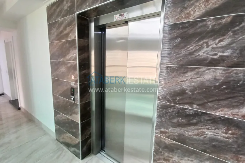 Apartament 1+1 w Mahmutlar, pod klucz z przeszklonym balkonem w nowoczesnym kompleksie 19 