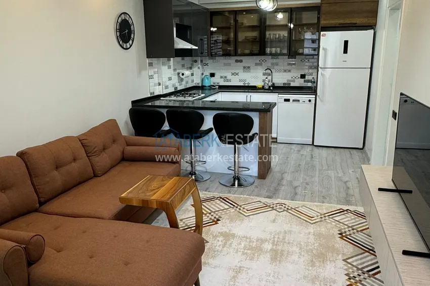 Kupuj  Jednopokojowy apartament z meblami w zadbanym kompleksie — Mersin, dzielnica Tomyuk 1 