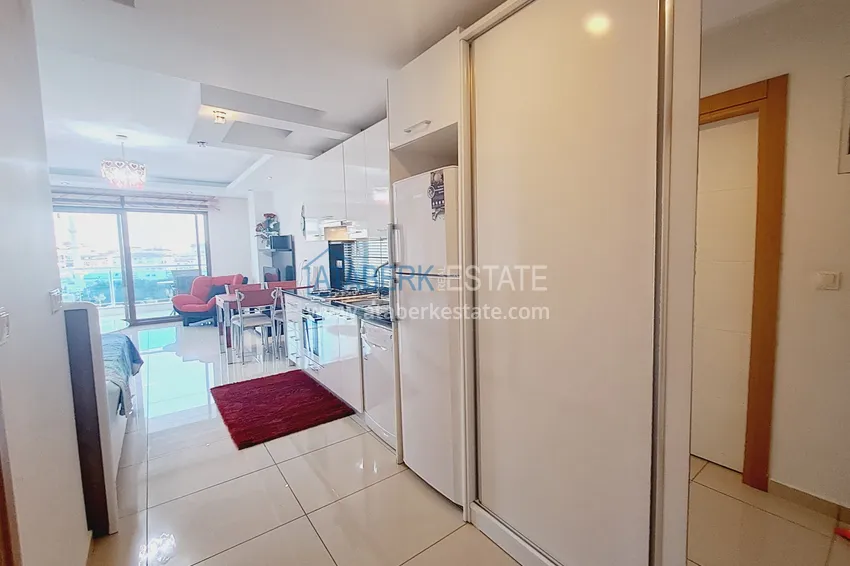 Kupuj  Umeblowany apartament typu studio w prestiżowym kompleksie mieszkalnym - dzielnica Cikcilli, Alanya 1 