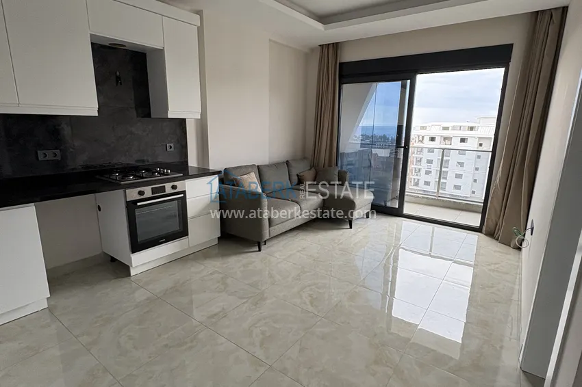 Kupuj  Apartament 1+1 z meblami i widokiem na morze, dzielnica Mahmutlar — Alanya  1 