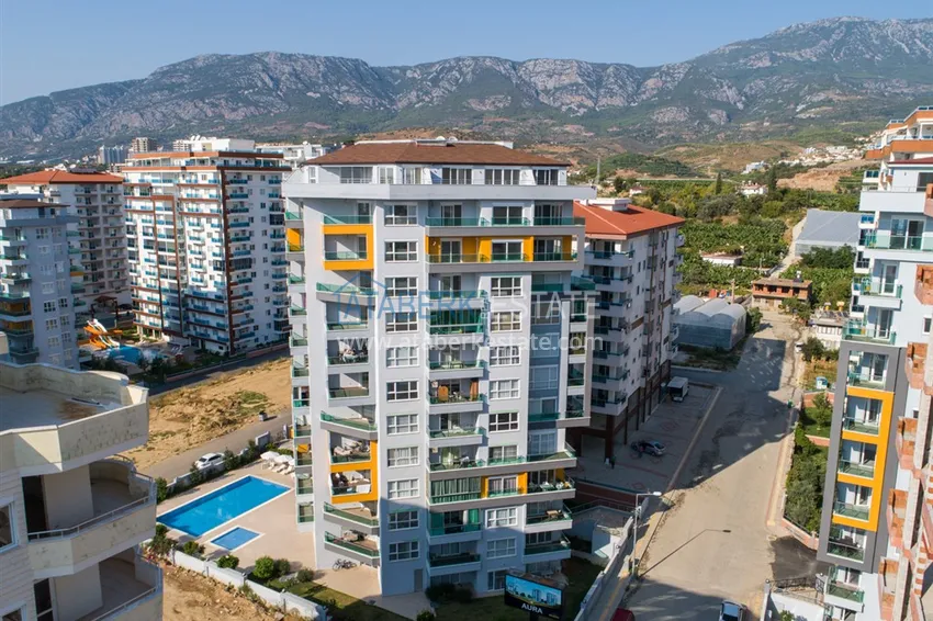 Apartament 1+1 w Mahmutlar, pod klucz z przeszklonym balkonem w nowoczesnym kompleksie 1 