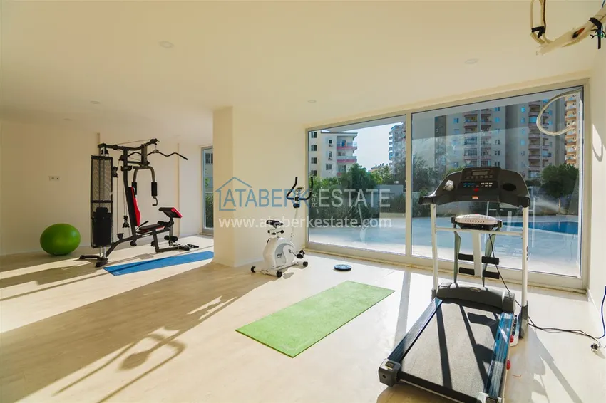 Apartament 1+1 w Mahmutlar, pod klucz z przeszklonym balkonem w nowoczesnym kompleksie 20 