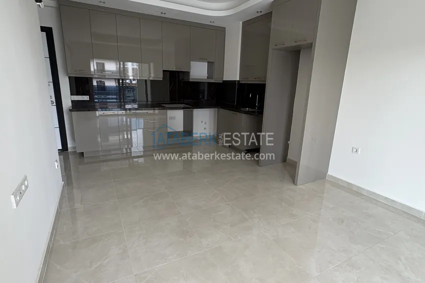 Kupuj  Apartament 1+1 w młodym kompleksie, Mahmutlar — Sobotnia Dzielnica Targowa 2 
