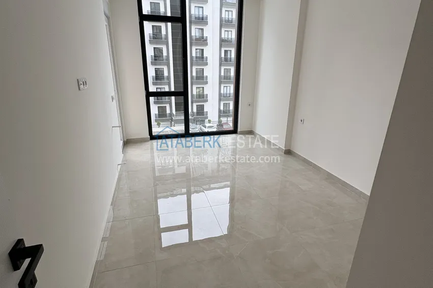 Kupuj  Apartament 1+1 w młodym kompleksie, Mahmutlar — Sobotnia Dzielnica Targowa 3 