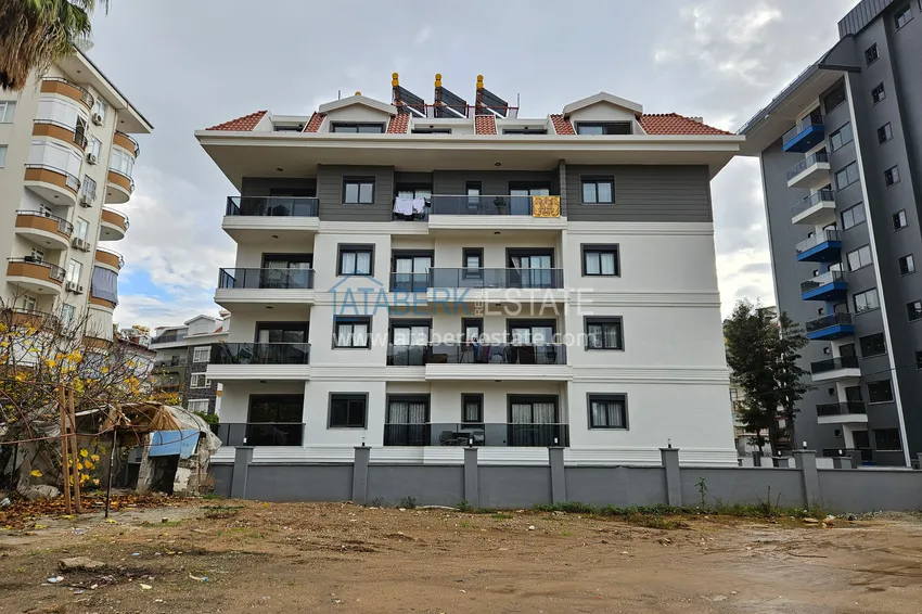 Apartament 1+1 w nowym kompleksie butikowym w centrum Alanyi, plaża Kleopatra 4 