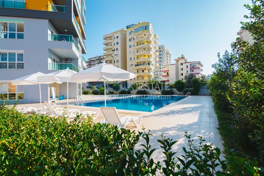 Apartament 1+1 w Mahmutlar, pod klucz z przeszklonym balkonem w nowoczesnym kompleksie 7 