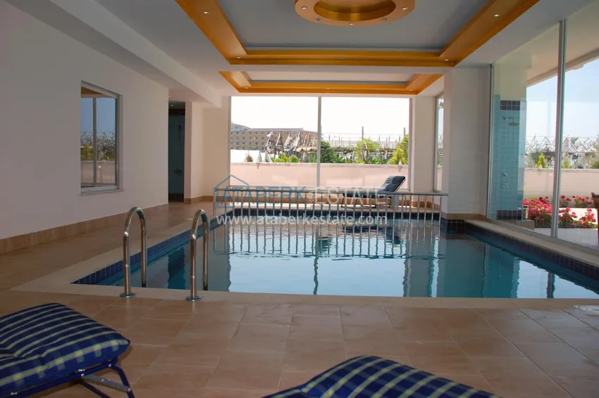 Dwupoziomowy penthouse w rejonie Kestel, umeblowany - pierwsza linia brzegowa  8 