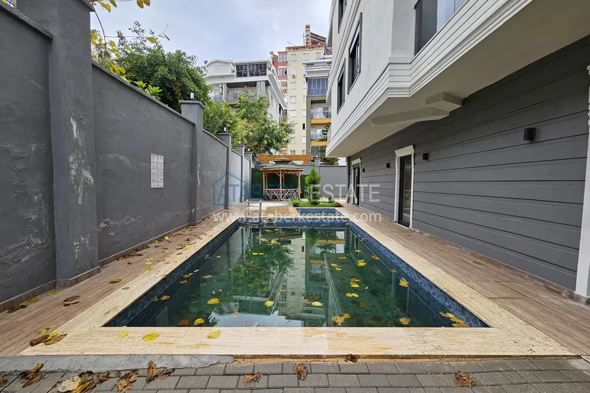 Apartament 1+1 w nowym kompleksie butikowym w centrum Alanyi, plaża Kleopatra 8 