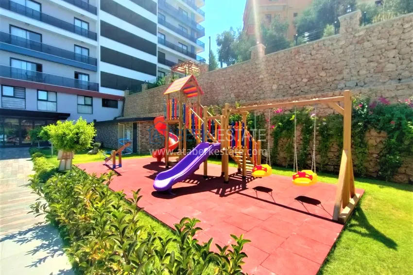 Apartament w Alanyi, dzielnica Tosmur - nowoczesne wnętrze, widok na morze i rzekę Dim 9 
