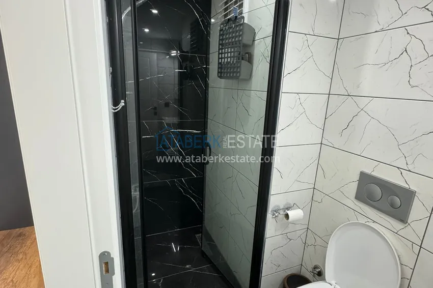 Kupuj  Jednopokojowy apartament z meblami w zadbanym kompleksie — Mersin, dzielnica Tomyuk 9 