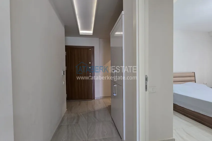 Kupuj  Jednopokojowy apartament z meblami w centrum Alanyi. Nieruchomości z zezwoleniem na pobyt 10 