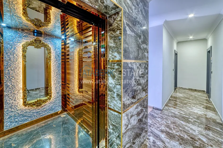 Apartament z 1 sypialnią i pięknym wykończeniem w dzielnicy Alanya Oba 12 