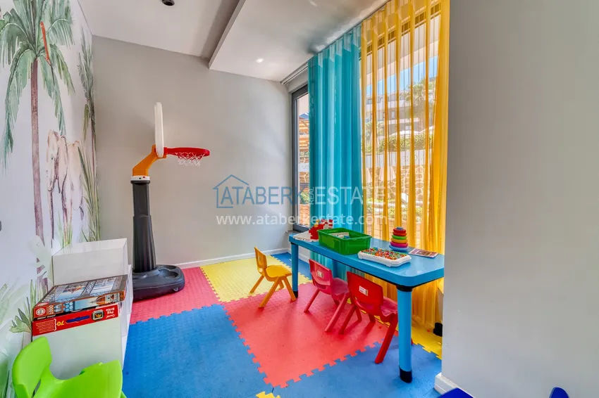 Apartament z 1 sypialnią i pięknym wykończeniem w dzielnicy Alanya Oba 13 
