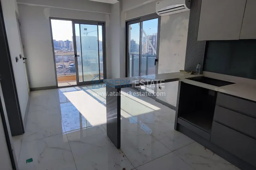 Kupuj  Apartamenty dla inwestorów w budowie kompleksu w dzielnicy Altintash w Antalyi 1 
