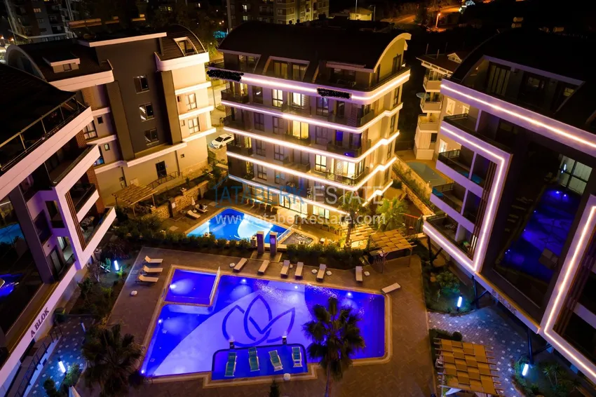Apartament z 1 sypialnią i pięknym wykończeniem w dzielnicy Alanya Oba 3 