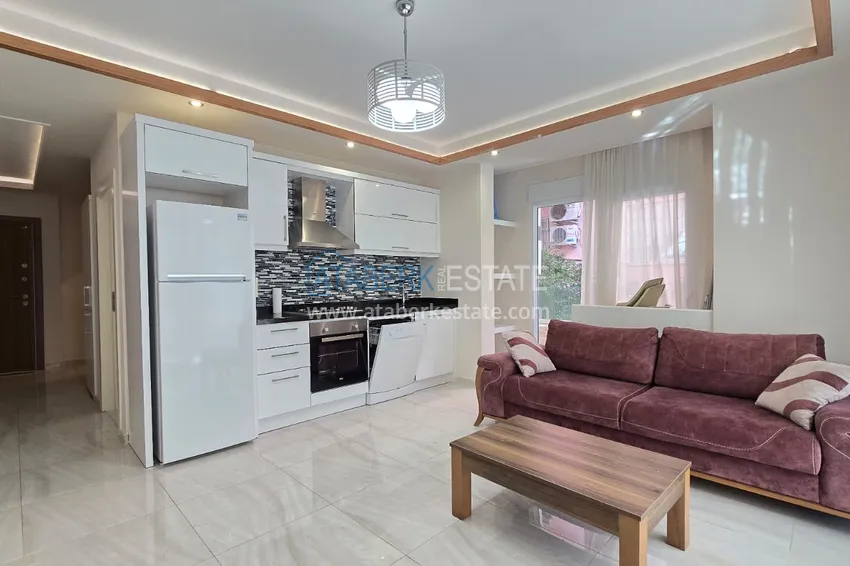 Kupuj  Jednopokojowy apartament z meblami w centrum Alanyi. Nieruchomości z zezwoleniem na pobyt 5 