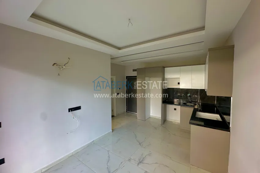 Kupuj  Apartament z 1 sypialnią i pięknym wykończeniem w dzielnicy Alanya Oba 5 