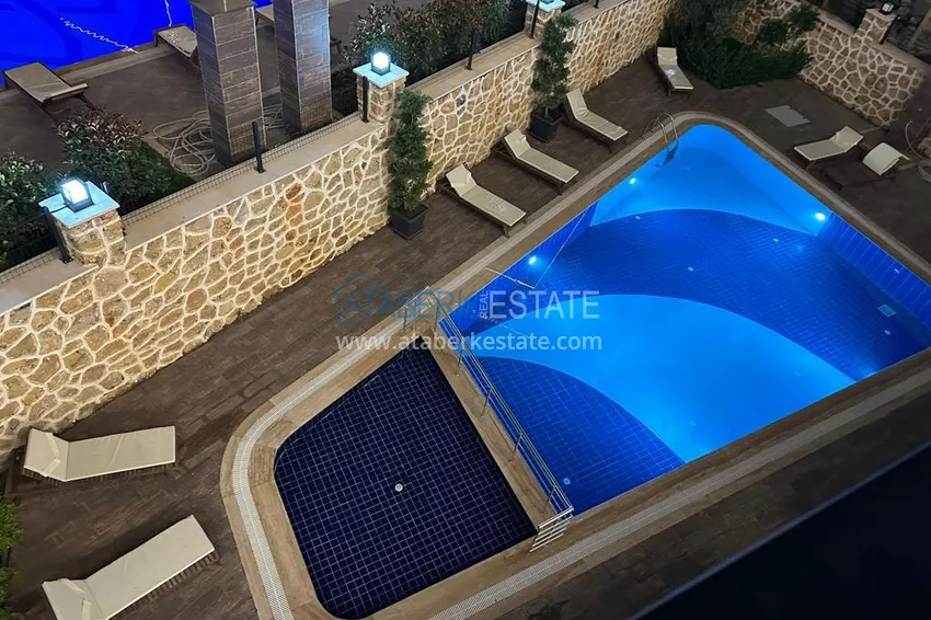 Apartament z 1 sypialnią i pięknym wykończeniem w dzielnicy Alanya Oba 5 