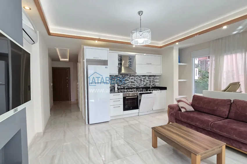 Kupuj  Jednopokojowy apartament z meblami w centrum Alanyi. Nieruchomości z zezwoleniem na pobyt 6 